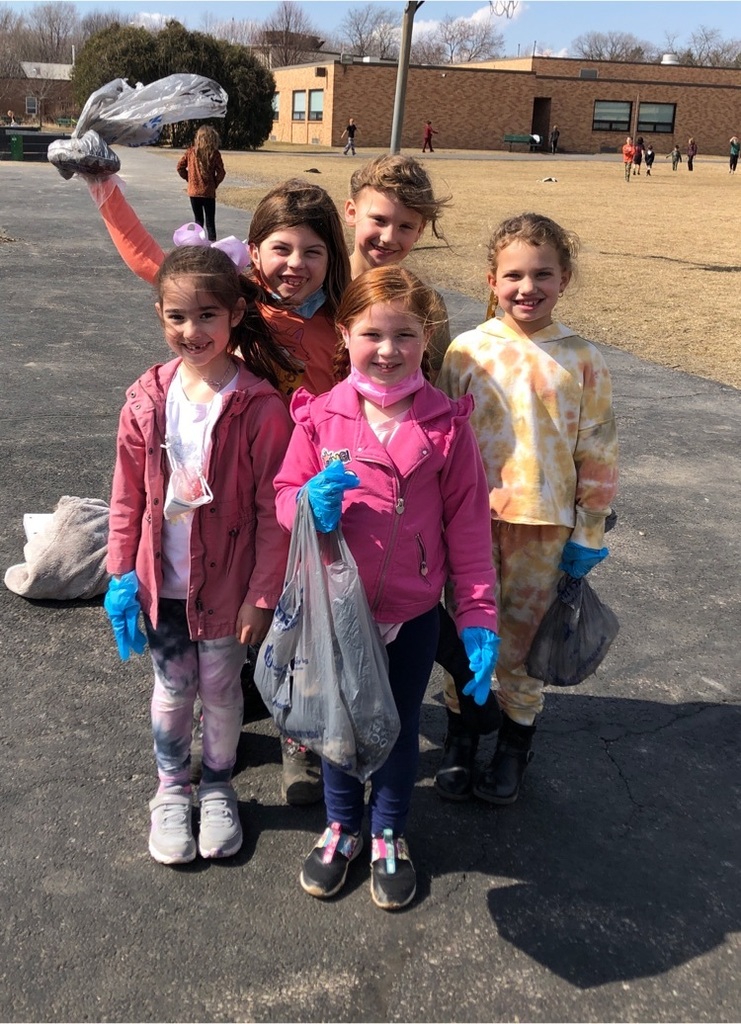 Second graders on a mission to beautify the playground!